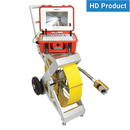 A mid-range HD stand cable with a self-leveling/pan-tilt-zoom camera and a multifunctional control station, featuring large rubber wheels, a screen, and a push type keyboard.