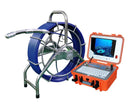 A borescope camera system with a pan-tilt head, push cable, control station with a LCD monitor, keyboard and joystick, all housed in a heavy-duty waterproof case.